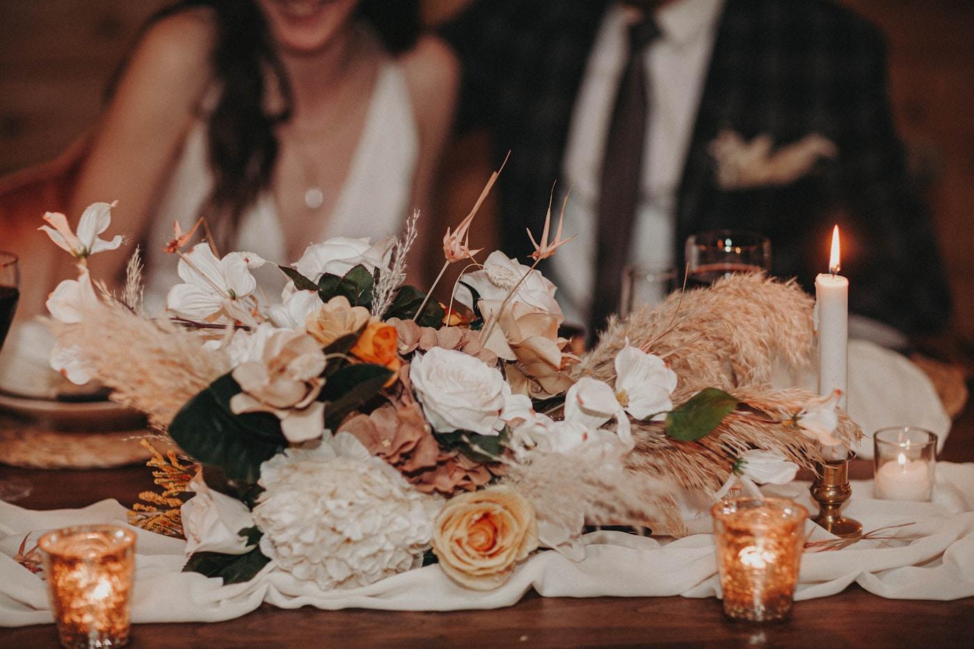 Flowers and candlelight on a wedding table
